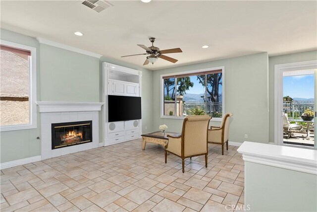10 Via Berrendo, Rancho Santa Margarita, CA 92688 - living area featuring a ceiling fan, healthy amount of natural light, a fireplace, and recessed lighting