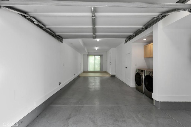 11304 Victory Blvd, North Hollywood, CA 91606 - garage with washing machine and clothes dryer and baseboards