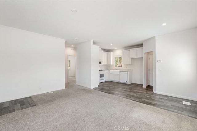 41559 Floyd Ct, Temecula, CA 92592 - unfurnished living room with recessed lighting, wood finished floors, ornamental molding, and carpet