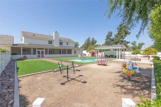 41559 Floyd Ct, Temecula, CA 92592 - exterior space with a sunroom, a shed, a patio area, and a pool