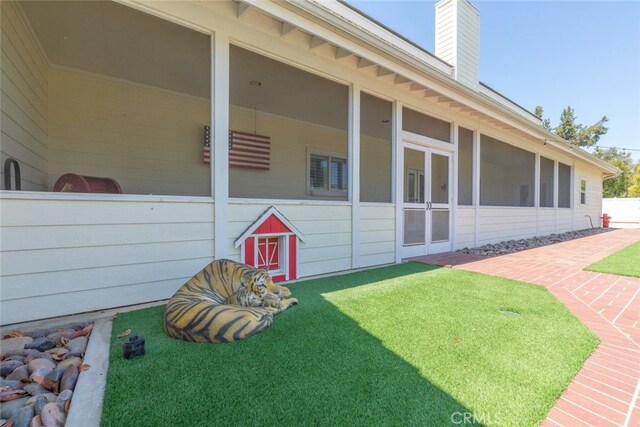 41559 Floyd Ct, Temecula, CA 92592 - view of grassy yard with a sunroom and a patio area
