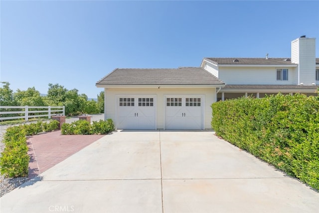 41559 Floyd Ct, Temecula, CA 92592 - view of front facade featuring an attached garage, concrete driveway, and a tile roof