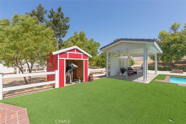 41559 Floyd Ct, Temecula, CA 92592 - view of yard with a patio, a storage unit, and an outdoor pool