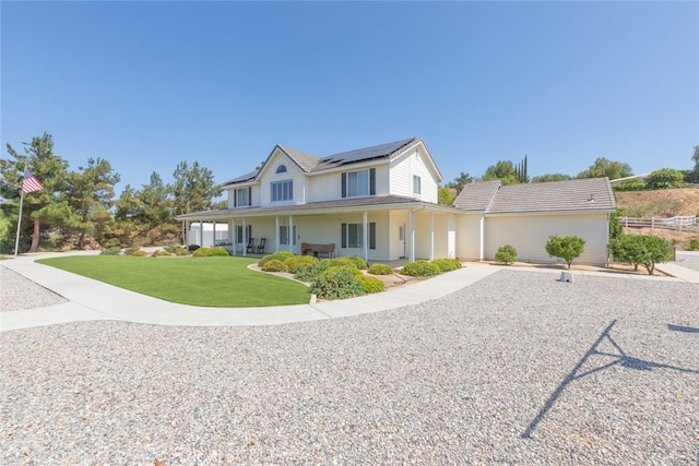 41559 Floyd Ct, Temecula, CA 92592 - farmhouse-style home featuring solar panels, a front yard, and a porch