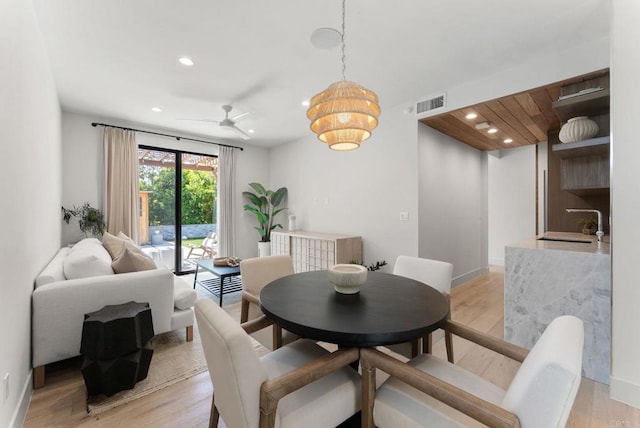 5530 Candlelight Dr, La Jolla, CA 92037 - dining area with recessed lighting, light wood-type flooring, ceiling fan, and a chandelier