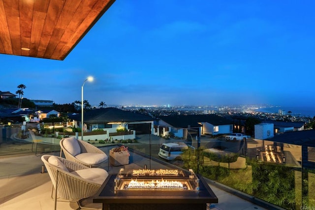 5530 Candlelight Dr, La Jolla, CA 92037 - balcony with a fire pit and a grill