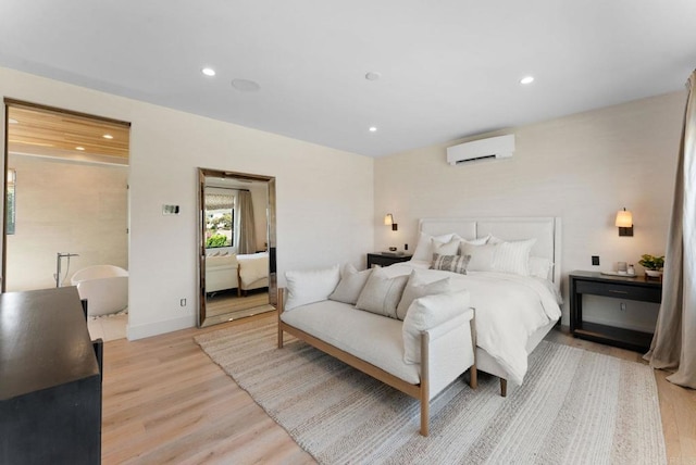 5530 Candlelight Dr, La Jolla, CA 92037 - bedroom with a wall mounted air conditioner, light wood-style floors, and recessed lighting