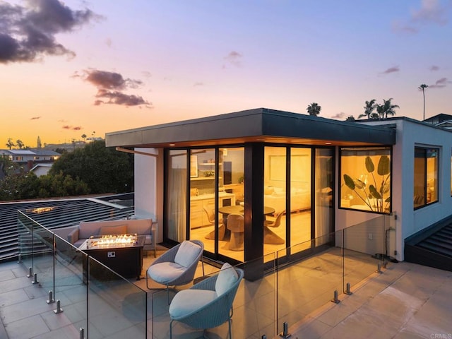 5530 Candlelight Dr, La Jolla, CA 92037 - back of house with a fire pit and a patio
