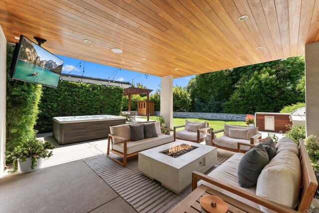 5530 Candlelight Dr, La Jolla, CA 92037 - view of patio featuring an outdoor living space with a fire pit, a shed, and a hot tub