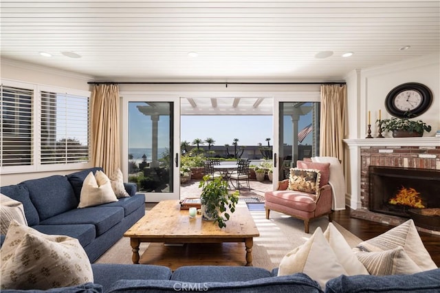 126 Monarch Bay, Dana Point, CA 92629 - living area featuring a brick fireplace, wood finished floors, crown molding, and wooden ceiling