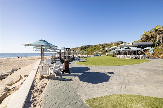 126 Monarch Bay, Dana Point, CA 92629 - view of home's community featuring a lawn and view of water and beach
