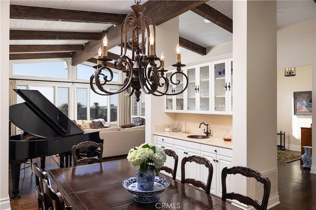 126 Monarch Bay, Dana Point, CA 92629 - dining space featuring dark wood-style floors, bar with sink, and a chandelier