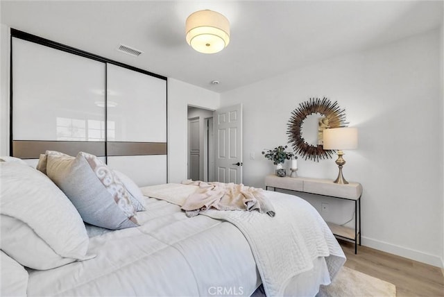 46079 Galaxy Ct, Temecula, CA 92592 - bedroom featuring wood finished floors and baseboards