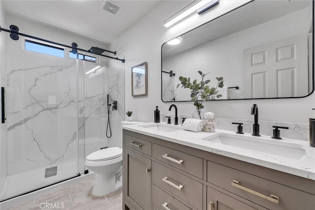 46079 Galaxy Ct, Temecula, CA 92592 - full bathroom featuring a marble finish shower and double vanity