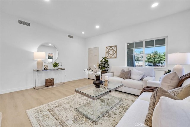 46079 Galaxy Ct, Temecula, CA 92592 - living area featuring wood finished floors and recessed lighting