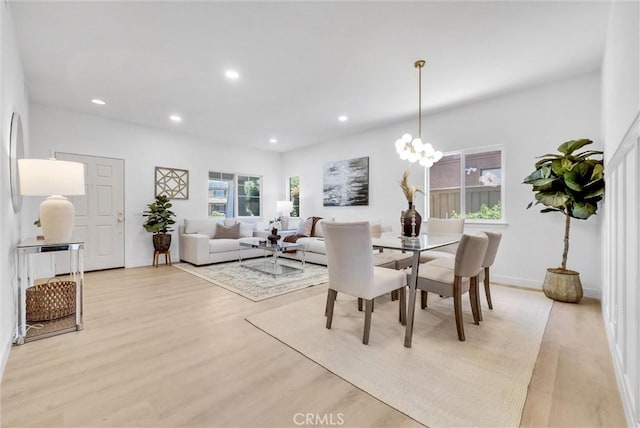 46079 Galaxy Ct, Temecula, CA 92592 - dining space with light wood finished floors, recessed lighting, and a chandelier