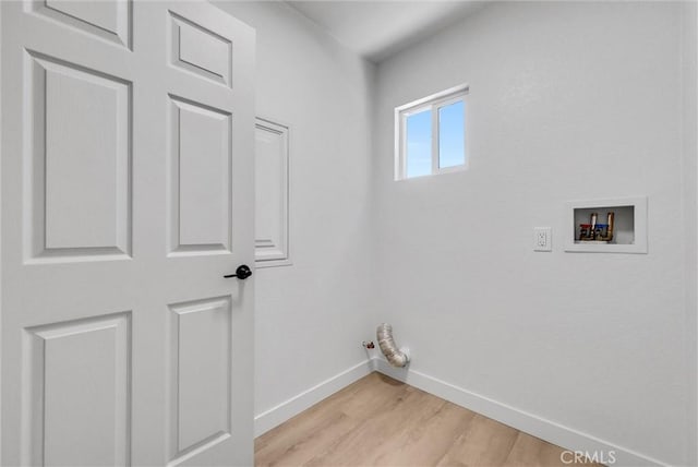 46079 Galaxy Ct, Temecula, CA 92592 - laundry room with hookup for a gas dryer, light wood finished floors, and hookup for a washing machine