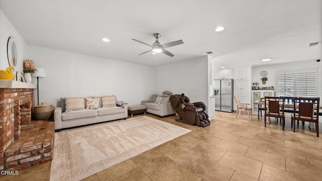 1652 Dewayne Ave, Camarillo, CA 93010 - living room featuring a ceiling fan, a fireplace, and recessed lighting