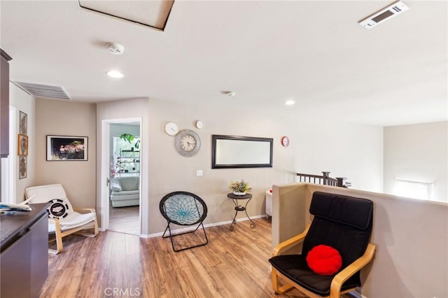 25880 Jumano Dr, Moreno Valley, CA 92551 - sitting room with light wood-type flooring and recessed lighting