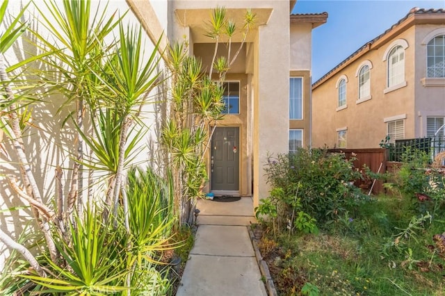 25880 Jumano Dr, Moreno Valley, CA 92551 - entrance to property featuring stucco siding