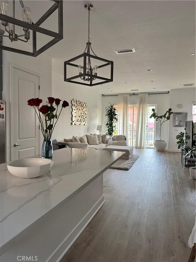 15946 Ellington, Chino Hills, CA 91709 - dining space featuring a chandelier and wood finished floors