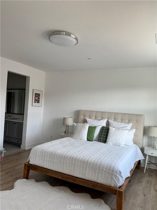 15946 Ellington, Chino Hills, CA 91709 - bedroom with wood finished floors and ensuite bathroom