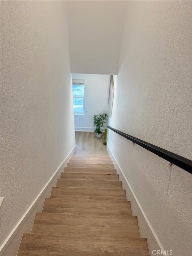 15946 Ellington, Chino Hills, CA 91709 - staircase with wood finished floors and a textured wall