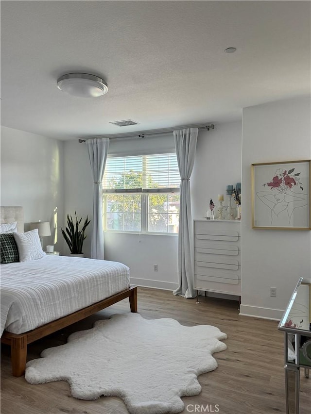 15946 Ellington, Chino Hills, CA 91709 - bedroom with baseboards and wood finished floors