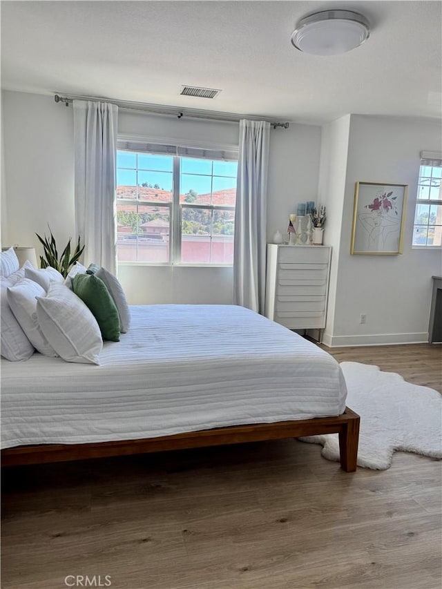 15946 Ellington, Chino Hills, CA 91709 - bedroom with baseboards and wood finished floors