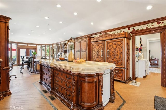 2211 N Moody Ave, Fullerton, CA 92831 - kitchen featuring recessed lighting, ornamental molding, and a center island
