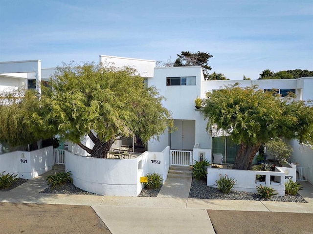 159 Mozart Ave, Cardiff By The Sea, CA 92007 - view of front of house featuring a fenced front yard, a gate, and stucco siding