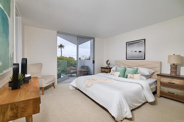 159 Mozart Ave, Cardiff By The Sea, CA 92007 - bedroom featuring access to exterior, carpet floors, and a wall of windows