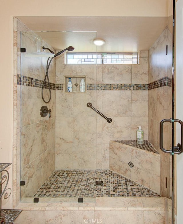 5521 Via La Mesa Unit C, Laguna Woods, CA 92637 - bathroom with a shower stall and plenty of natural light