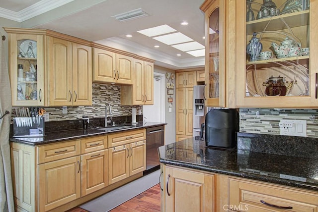5521 Via La Mesa Unit C, Laguna Woods, CA 92637 - kitchen featuring stainless steel appliances, glass insert cabinets, decorative backsplash, dark stone countertops, and crown molding