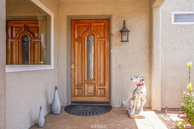5521 Via La Mesa Unit C, Laguna Woods, CA 92637 - entrance to property featuring stucco siding