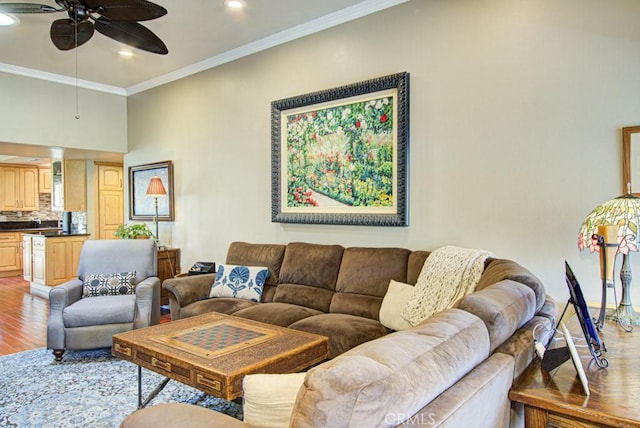 5521 Via La Mesa Unit C, Laguna Woods, CA 92637 - living area with light wood-type flooring, ornamental molding, a ceiling fan, and recessed lighting