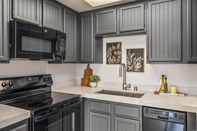 1508 Circa Del Lago Blvd Unit B204, San Marcos, CA 92078 - kitchen featuring black appliances, light countertops, and gray cabinets