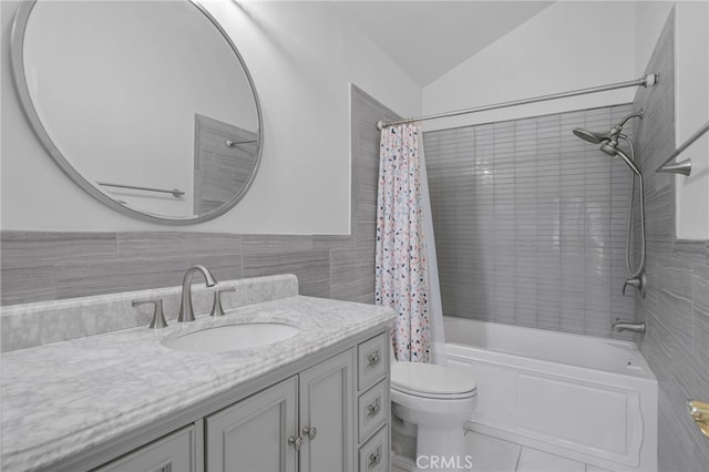 339 W Dawson Ct, Glendora, CA 91740 - bathroom featuring vanity, shower / bath combo with shower curtain, tile walls, and lofted ceiling