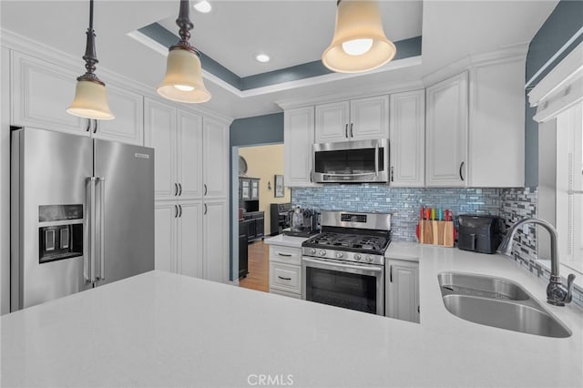 339 W Dawson Ct, Glendora, CA 91740 - kitchen featuring stainless steel appliances, light countertops, backsplash, pendant lighting, and white cabinets