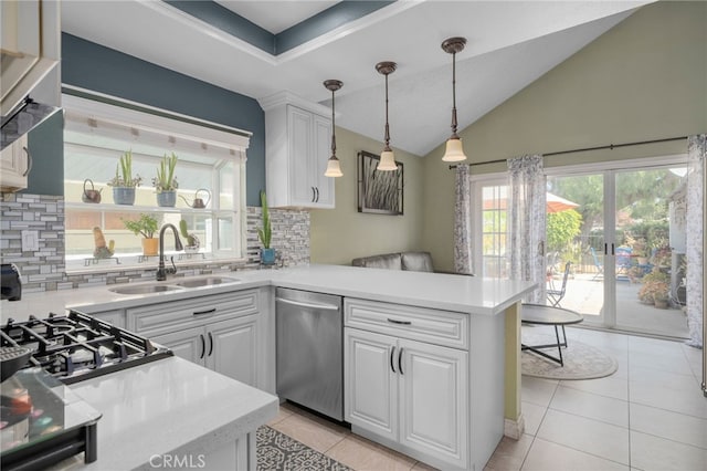 339 W Dawson Ct, Glendora, CA 91740 - kitchen with stainless steel dishwasher, backsplash, a peninsula, light countertops, and light tile patterned floors