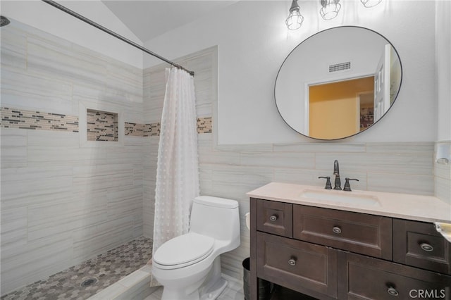 339 W Dawson Ct, Glendora, CA 91740 - full bath featuring vanity, tile walls, a tile shower, and vaulted ceiling