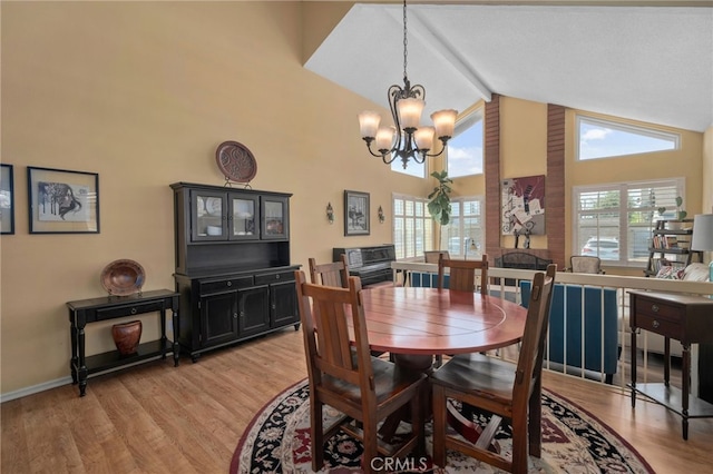 339 W Dawson Ct, Glendora, CA 91740 - dining space featuring high vaulted ceiling, a chandelier, light wood-style flooring, and beamed ceiling