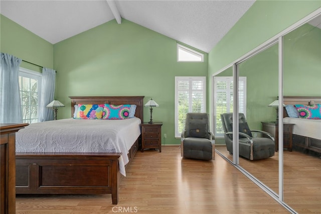 339 W Dawson Ct, Glendora, CA 91740 - bedroom featuring beam ceiling, wood finished floors, high vaulted ceiling, multiple windows, and a closet