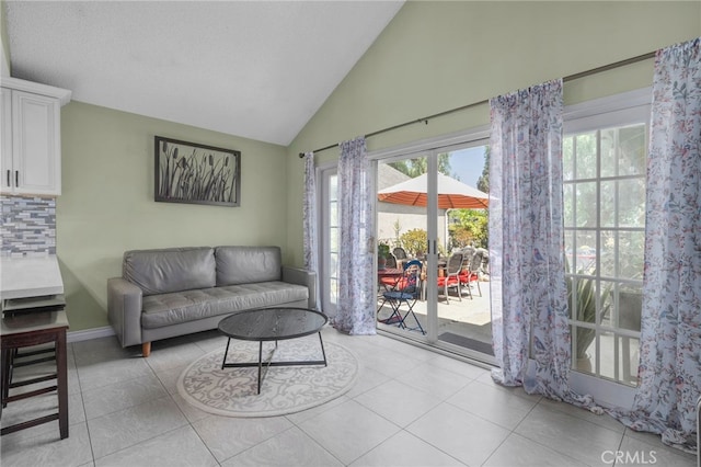 339 W Dawson Ct, Glendora, CA 91740 - living room with light tile patterned floors and high vaulted ceiling