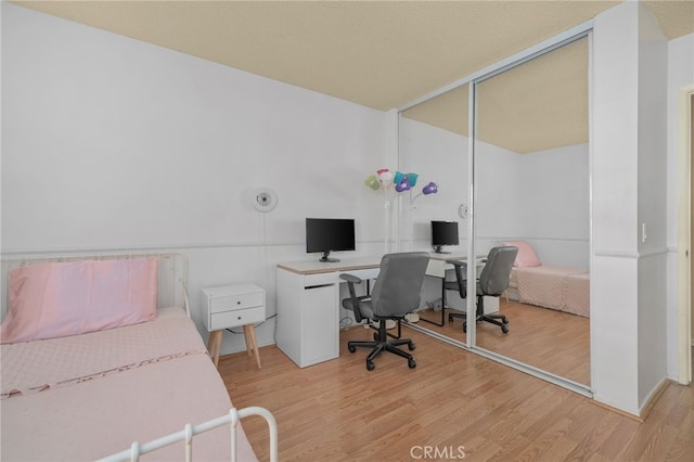 339 W Dawson Ct, Glendora, CA 91740 - bedroom with wood finished floors, an office area, and a closet