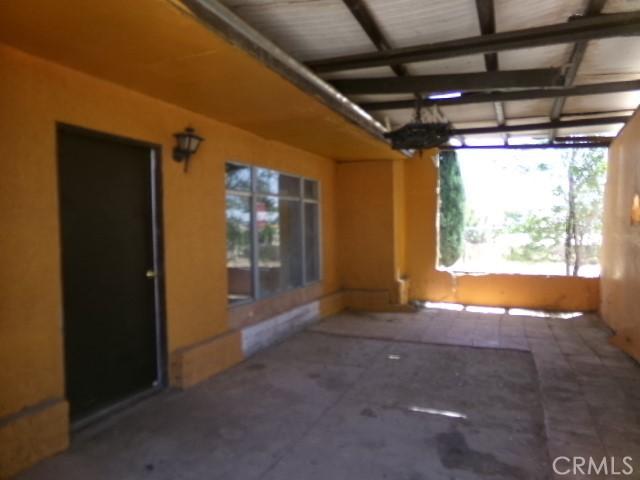 34915 Cedar Rd, Barstow, CA 92311 - unfurnished sunroom with healthy amount of natural light