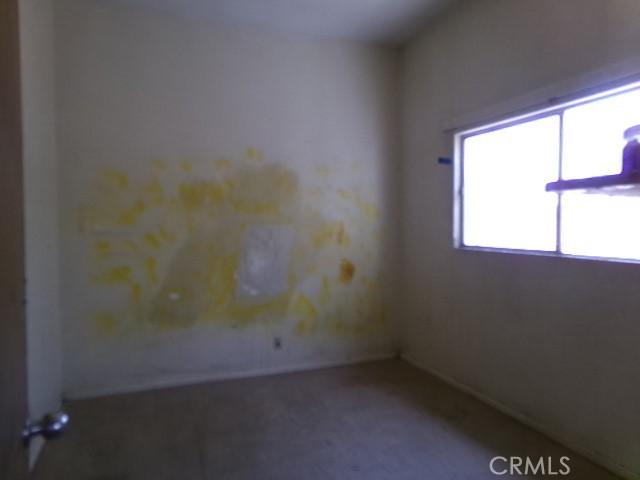 34915 Cedar Rd, Barstow, CA 92311 - unfurnished room featuring carpet