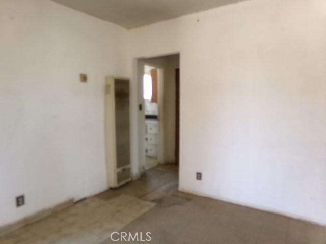 34915 Cedar Rd, Barstow, CA 92311 - unfurnished room featuring carpet floors