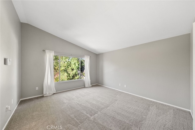 45114 Via Quivera, Temecula, CA 92592 - carpeted empty room with vaulted ceiling and baseboards