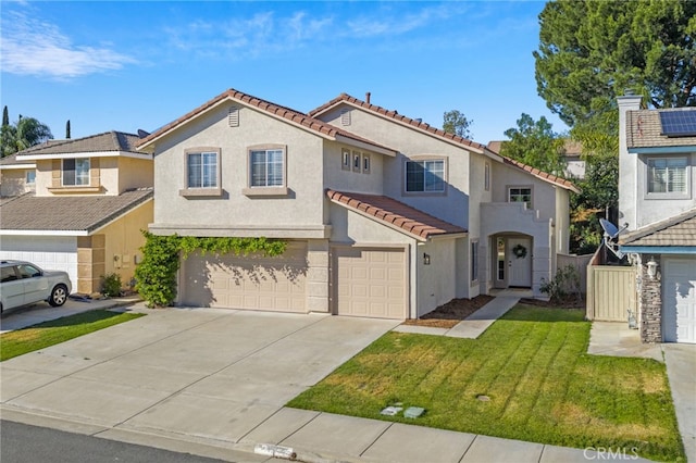 45114 Via Quivera, Temecula, CA 92592 - view of front of house featuring a tile roof, stucco siding, a garage, and concrete driveway